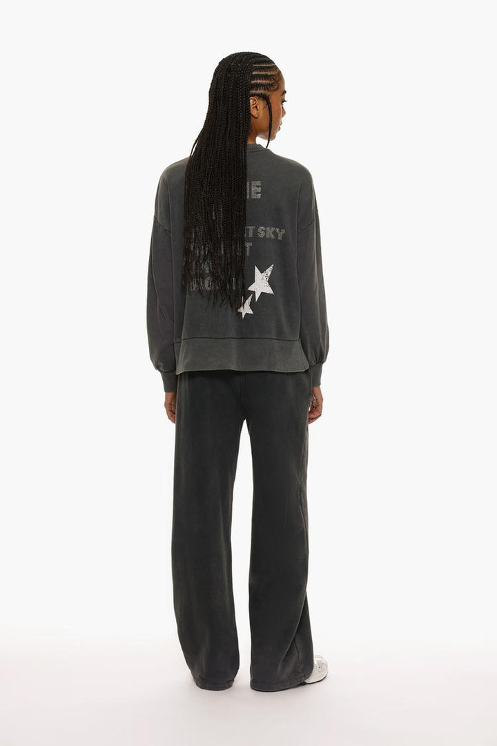 Acid wash plush trousers back view showcasing the relaxed fit and distressed detailing.