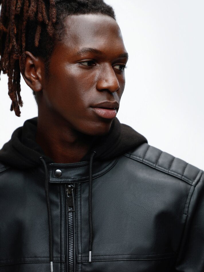 Blackout Urban Leather Jacket close-up – highlighting its sleek black leather material, zip-up front, and built-in hood for a modern urban style.