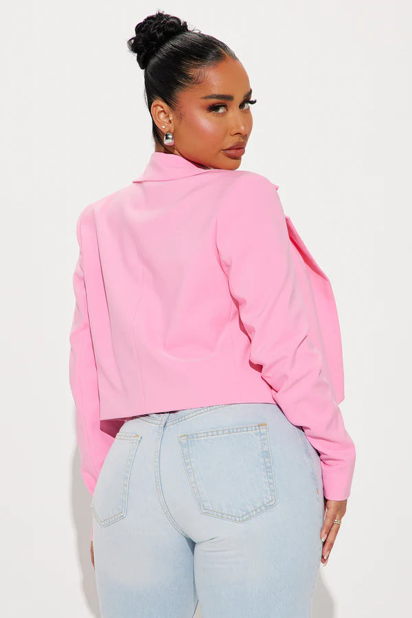 Back view of the Classic Cropped Blazer in pink, emphasizing its clean lines and elegant cut.