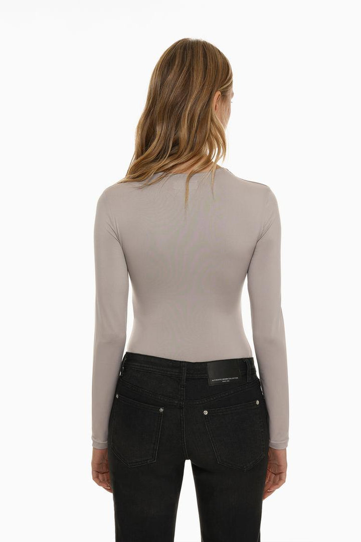 Back view of the grey polyamide round neck bodysuit, highlighting the smooth, stretchy fabric and seamless design for a sleek and comfortable fit.