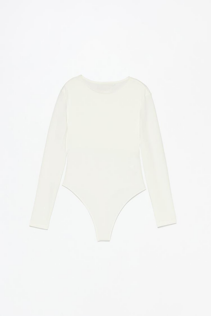 White polyamide round neck bodysuit, crafted from soft, stretchy fabric for a flattering fit. Perfect for layering or wearing on its own, offering a sleek and versatile look.