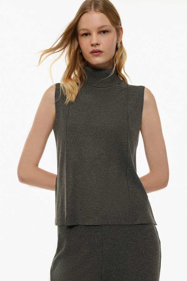 Front view of the grey soft-touch vest sweater, showcasing its simple design, soft fabric, and relaxed fit, perfect for creating a casual yet stylish look.