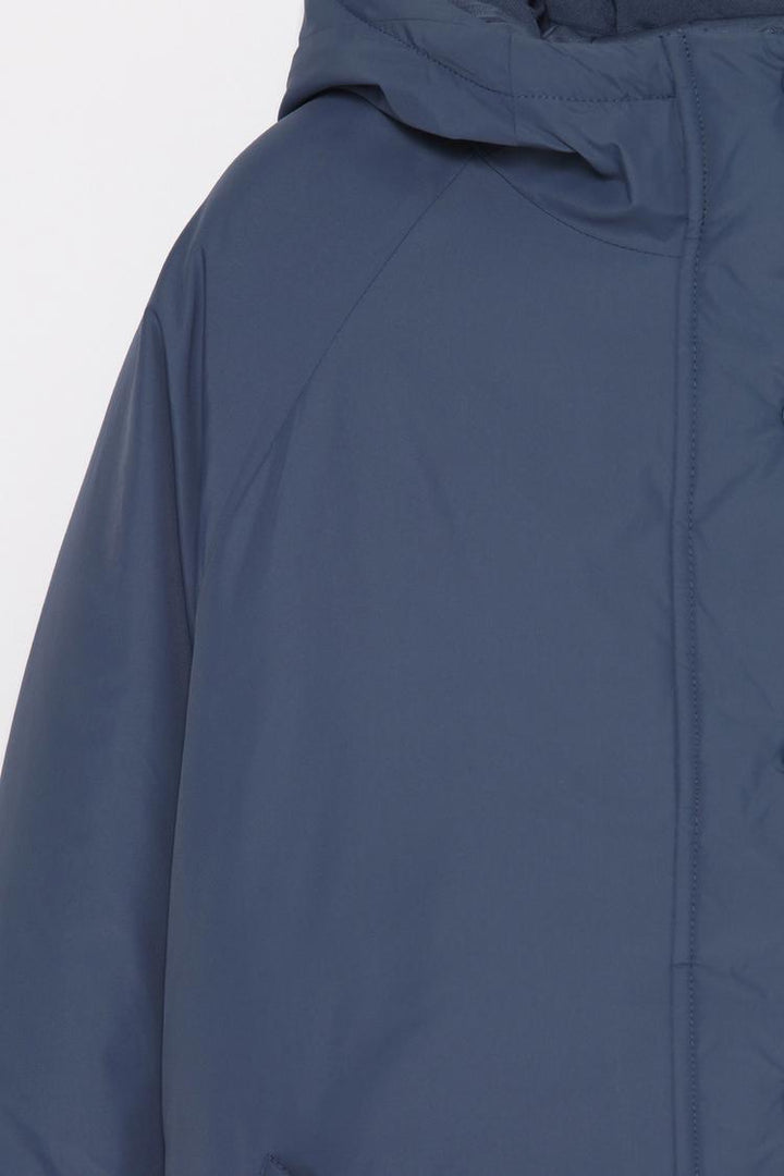 Basic Puffer Jacket - Close-Up of Women's Winter Jacket - Soft, Insulated Fabric and Stylish Design.