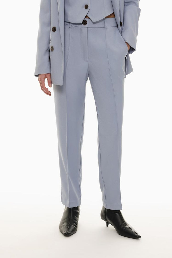 Front view of blue basic smart trousers, designed for a modern and polished appearance