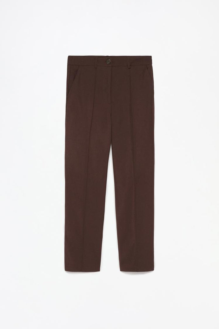 Front body view of brown basic smart trousers, emphasizing tailored structure and comfort