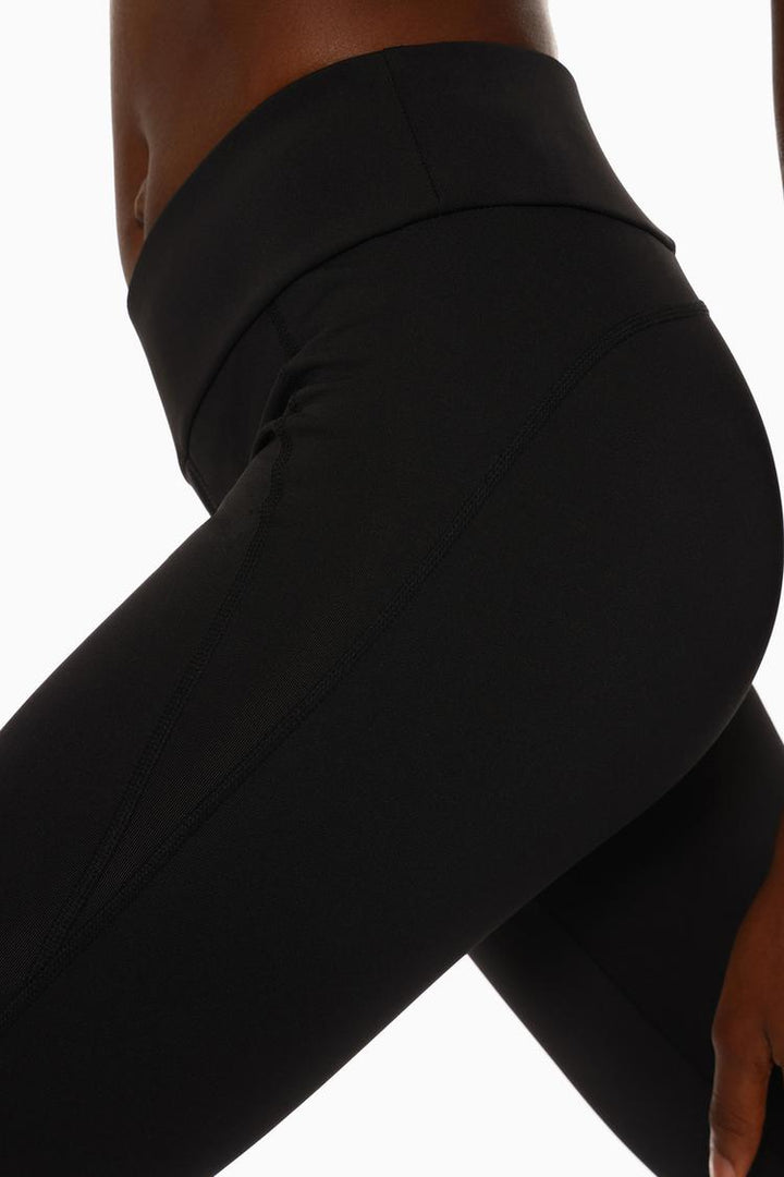 Side profile showing the contoured seams and flexibility of the fabric.