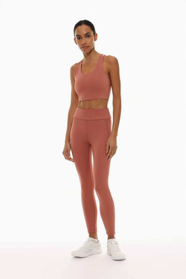 Vibrant pink sport leggings designed for comfort and flexibility, perfect for workouts or casual wear.