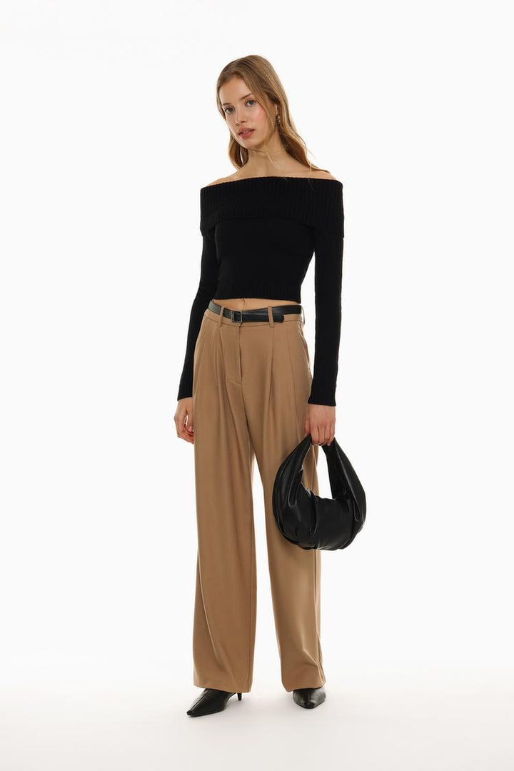 Stunning bronze belted wide-leg trousers in a captivating full-body view, perfect for a bold statement