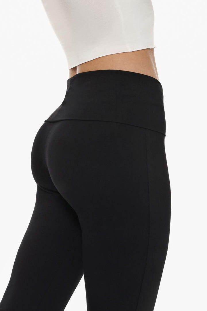 Back view emphasizing the seamless design and fold-over waist for comfort and support.