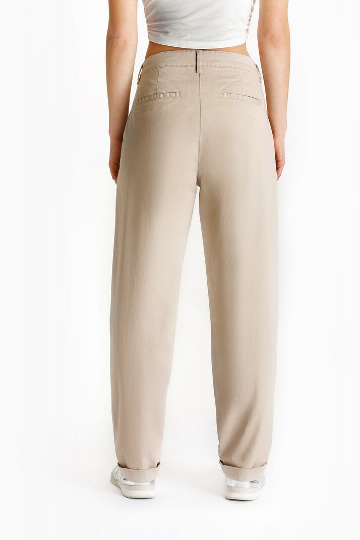 Back view emphasizing the pockets and fit of the chinos, with a focus on their tailored design.