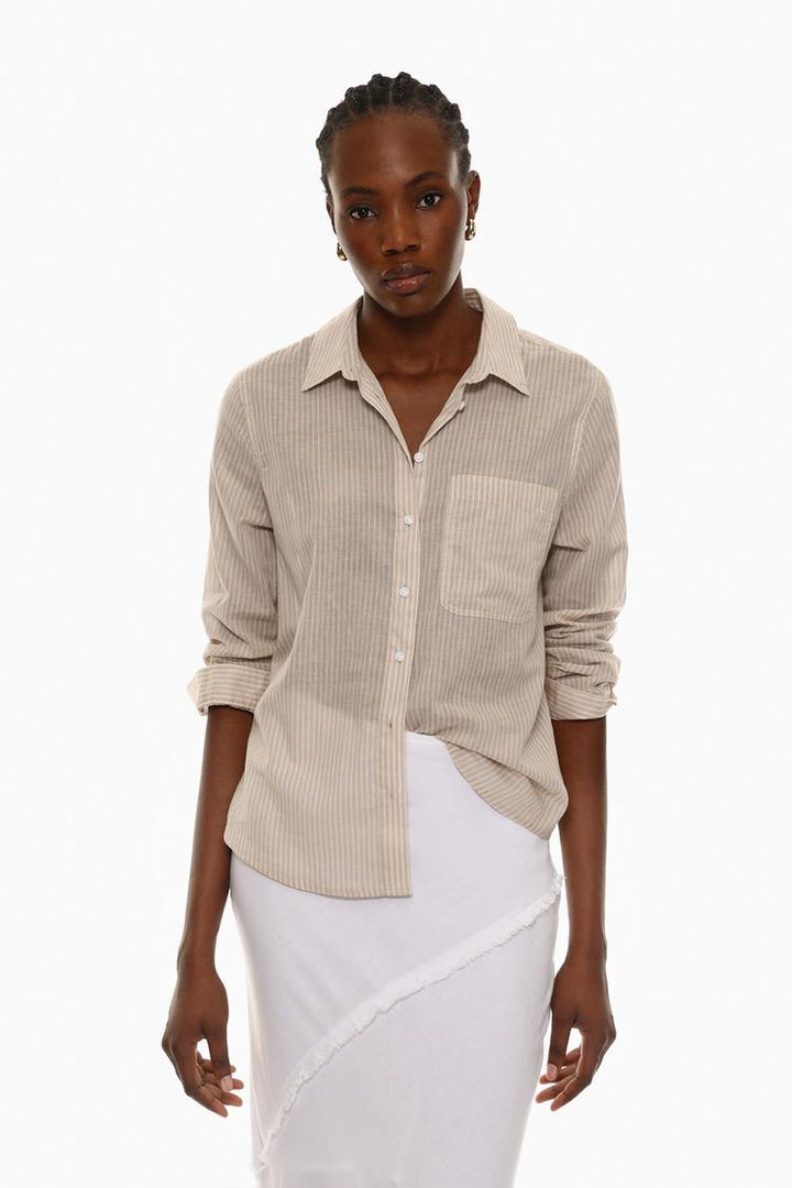 Cotton shirt beige front view with soft, breathable fabric for a comfortable fit.