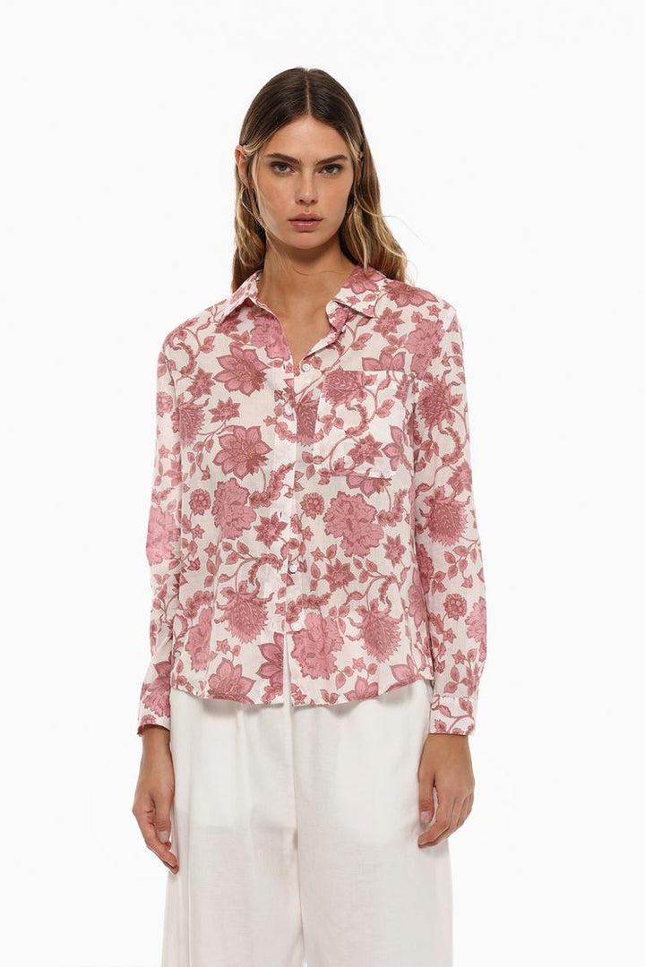 Cotton shirt in pink, front view showcasing its soft fabric and classic design.