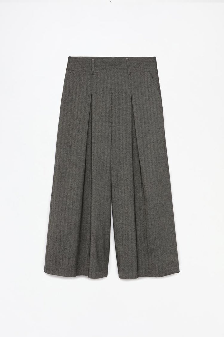 Full-product shot of grey culottes, showcasing their flattering fit and flowing design