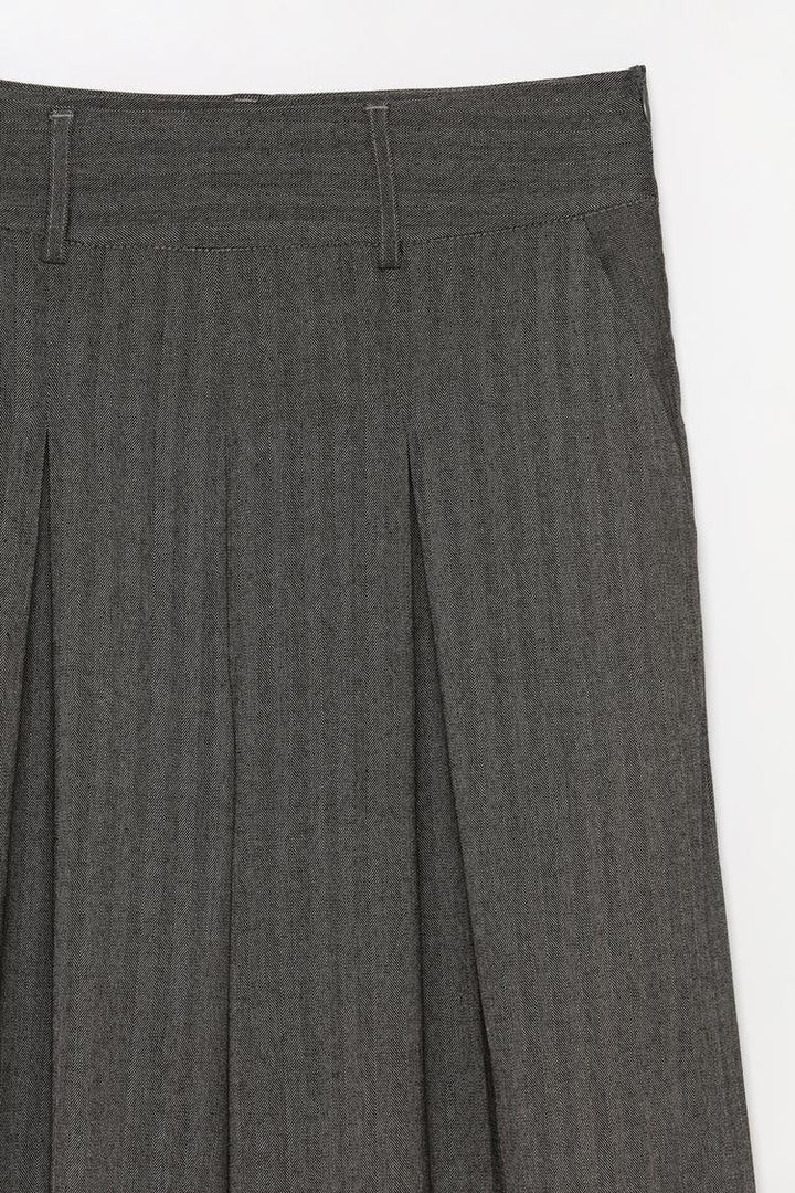 Product image of grey culottes, focusing on their understated and versatile charm