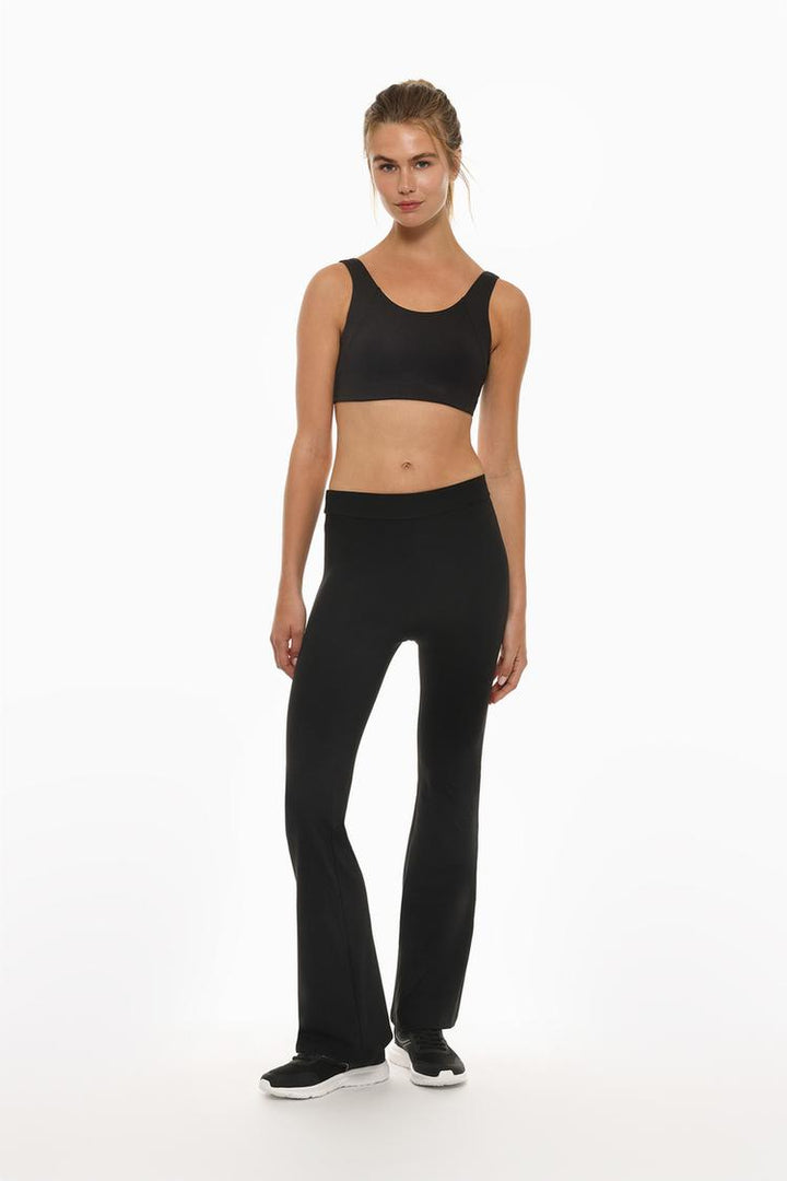 A sleek pair of black flared sports leggings, blending comfort and style for activewear enthusiasts.