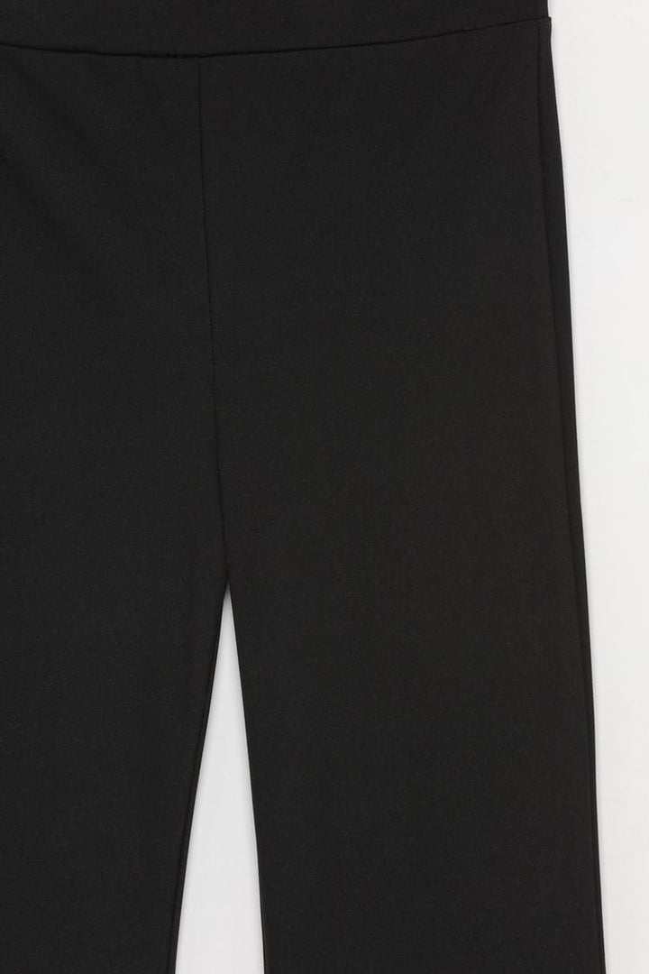 A standard product image of the black flared leggings, perfect for showcasing their aesthetic and functionality on listings.