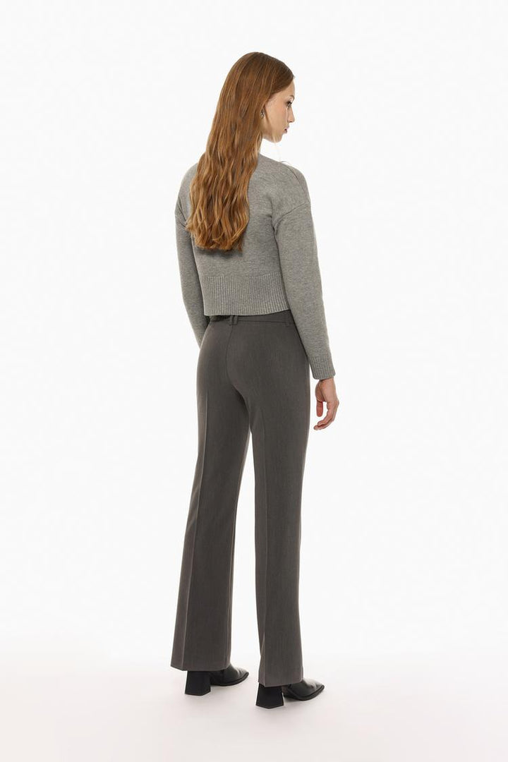 Front view of fashionable grey flared trousers, ideal for casual and formal looks