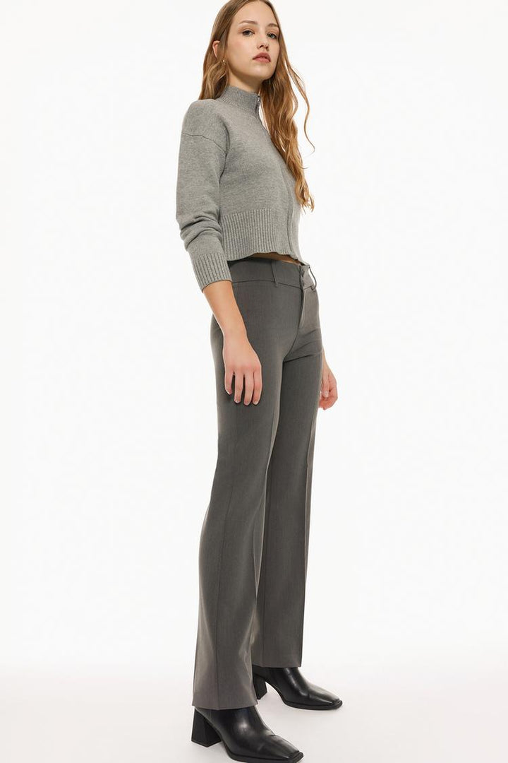 Sleek black flared trousers, perfect for versatile wardrobe combinations