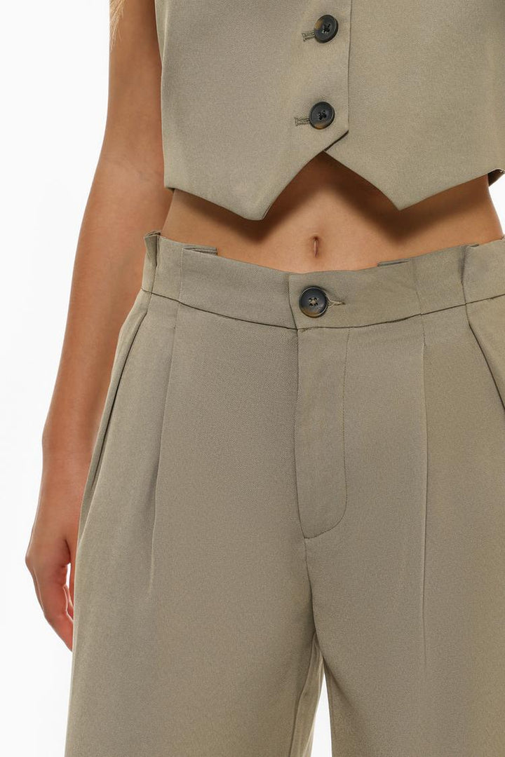 Front view of beige formal wide-leg trousers, perfect for professional or casual styling