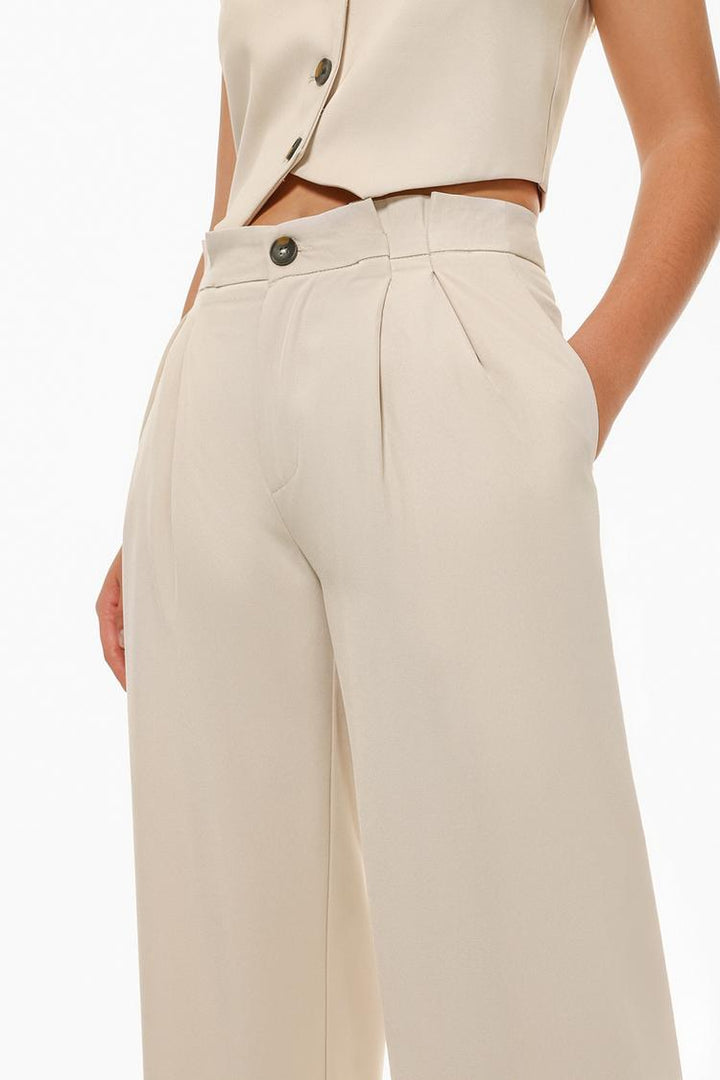 Frontal display of khaki formal wide-leg trousers, highlighting their clean lines