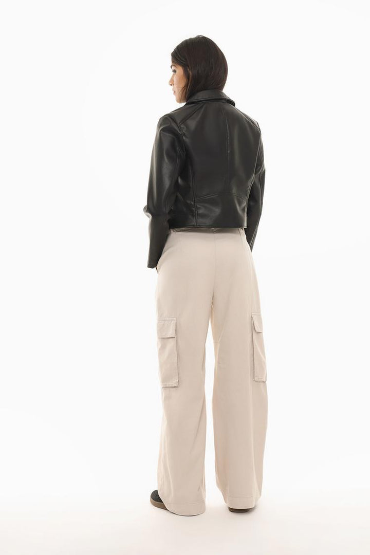 Rear view of the beige cargo trousers, highlighting the comfortable fit and back pocket details.