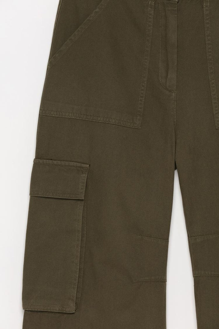 Deep dark green cargo trousers with a garment-dye finish, perfect for an outdoors-inspired style.