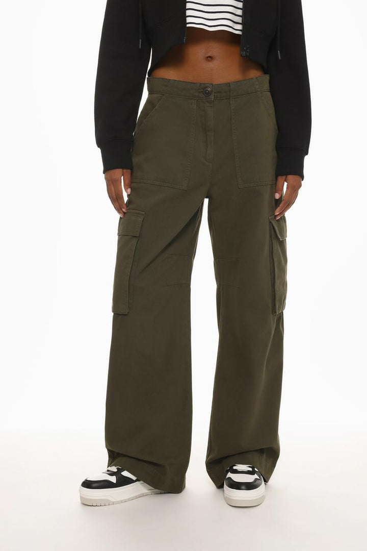 Front view of the dark green cargo trousers, showcasing their bold yet versatile color.