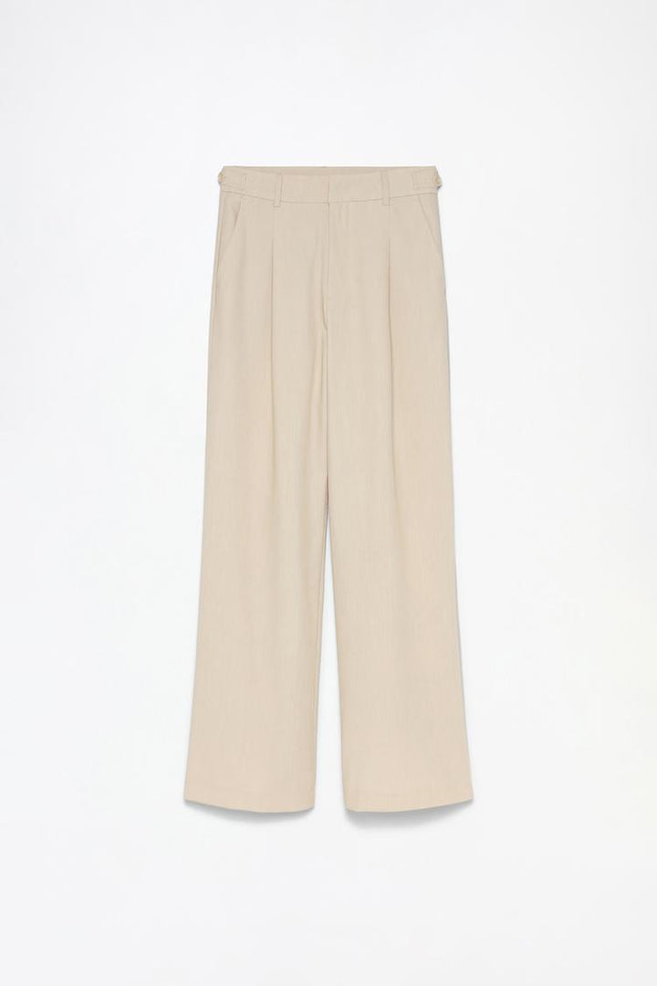 Complete product image of beige loose-fitting wide-leg trousers, a must-have for effortless style