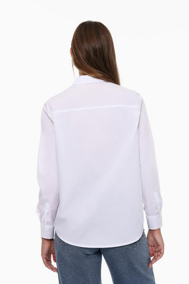 A product image showing the back of a poplin shirt would highlight the smooth, structured fabric and the shirt's clean lines. It would emphasize details like the shirt’s yoke (the section across the upper back), the pleats (if any), and the seam finishing. The focus would be on the overall fit, showing how the shirt drapes down the back, with the collar, buttons, and any logo or tag placement also visible. This type of image allows customers to see the full design of the back of the shirt for a complete loo