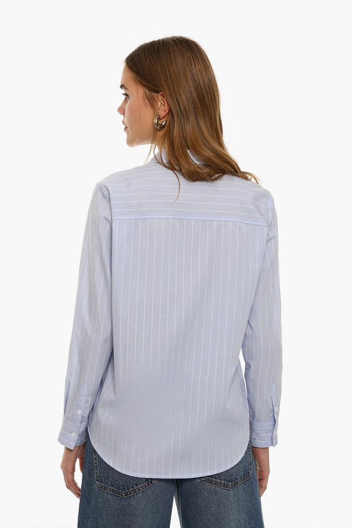 Back view of a blue poplin shirt, showcasing the clean, tailored fit, smooth fabric, and subtle seam details for a polished appearance.