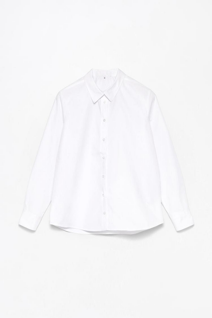 A full product image of a poplin shirt typically showcases the entire garment, highlighting its tailored structure, crisp fabric, and classic style. The shirt’s smooth texture and sleek appearance are often displayed in a well-lit image, with the buttons, collar, and sleeves visible to emphasize its versatility for both casual and formal settings. The clean lines of the shirt make it a popular choice for a refined yet comfortable look.