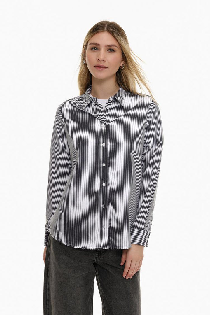 Grey poplin shirt showcasing a classic design with a crisp finish, perfect for both formal and casual looks.