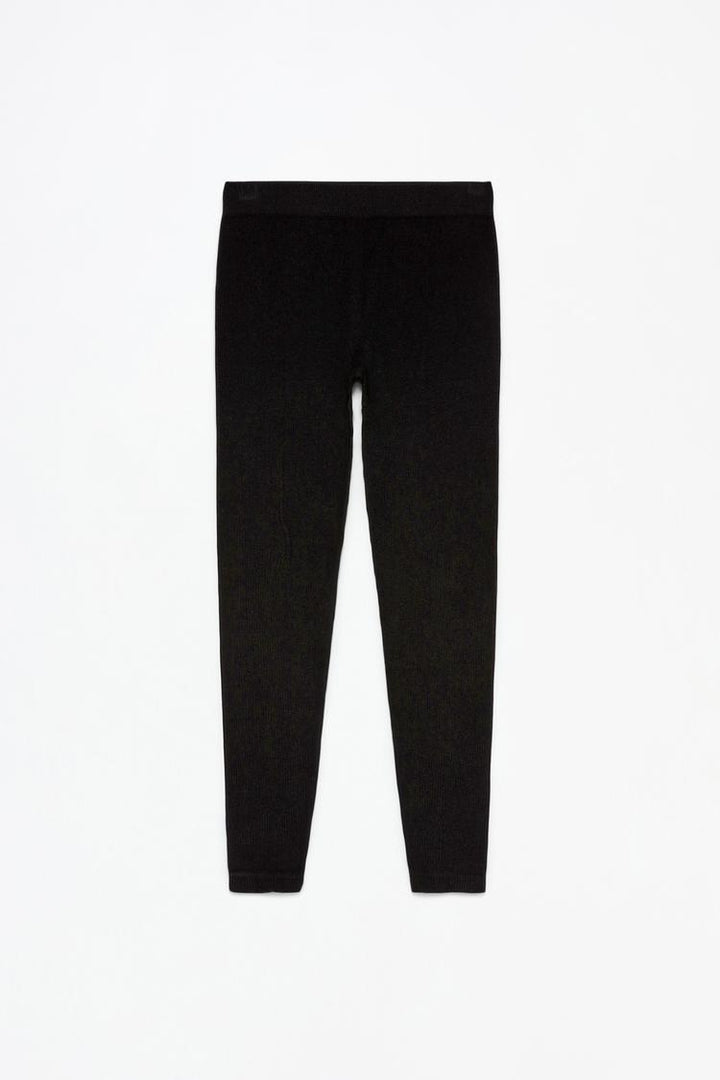 Product view emphasizing the simple, sleek design of the black leggings.