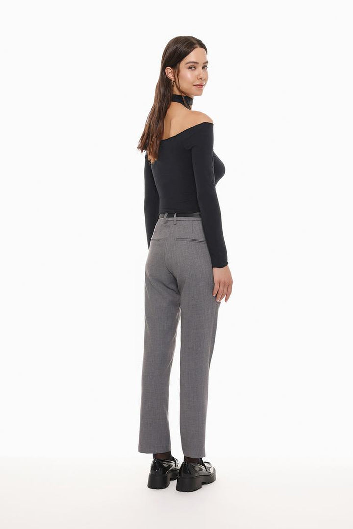 Back view of grey slim fit trousers with a belt, highlighting their clean lines