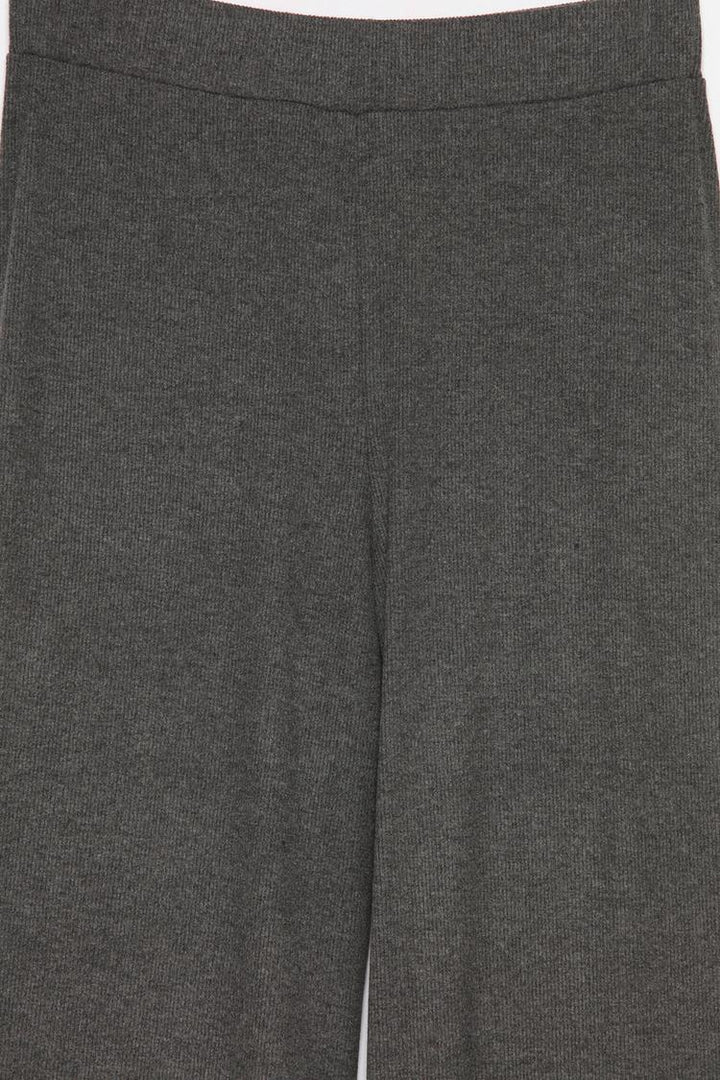 A standard product image of the grey trousers, emphasizing their design and fabric quality for listings.