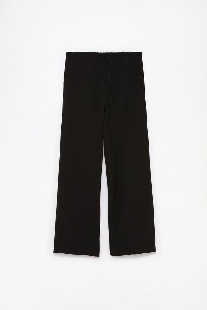 Full product view of black straight-fit trousers, showcasing their sleek and professional design