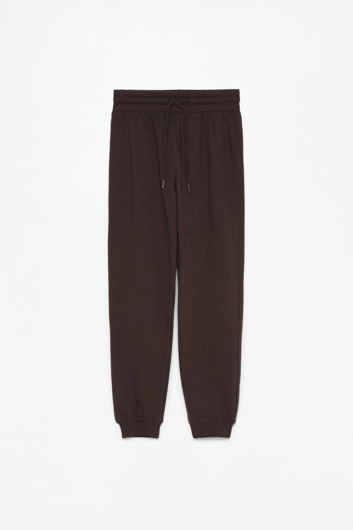 Tracksuit bottoms brown full product view displaying the overall design, waistband details, and soft fabric for a comfortable and stylish appearance.