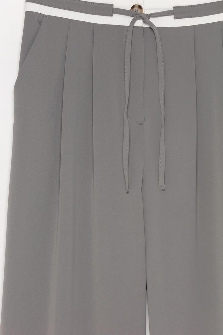 Standard product image showcasing the wide-leg trousers with a focus on their design and material details.