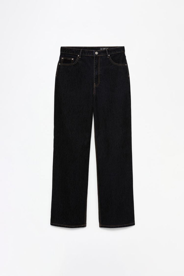 Complete product image of the wide-leg velvety jeans, emphasizing their luxurious texture and effortless drape.

